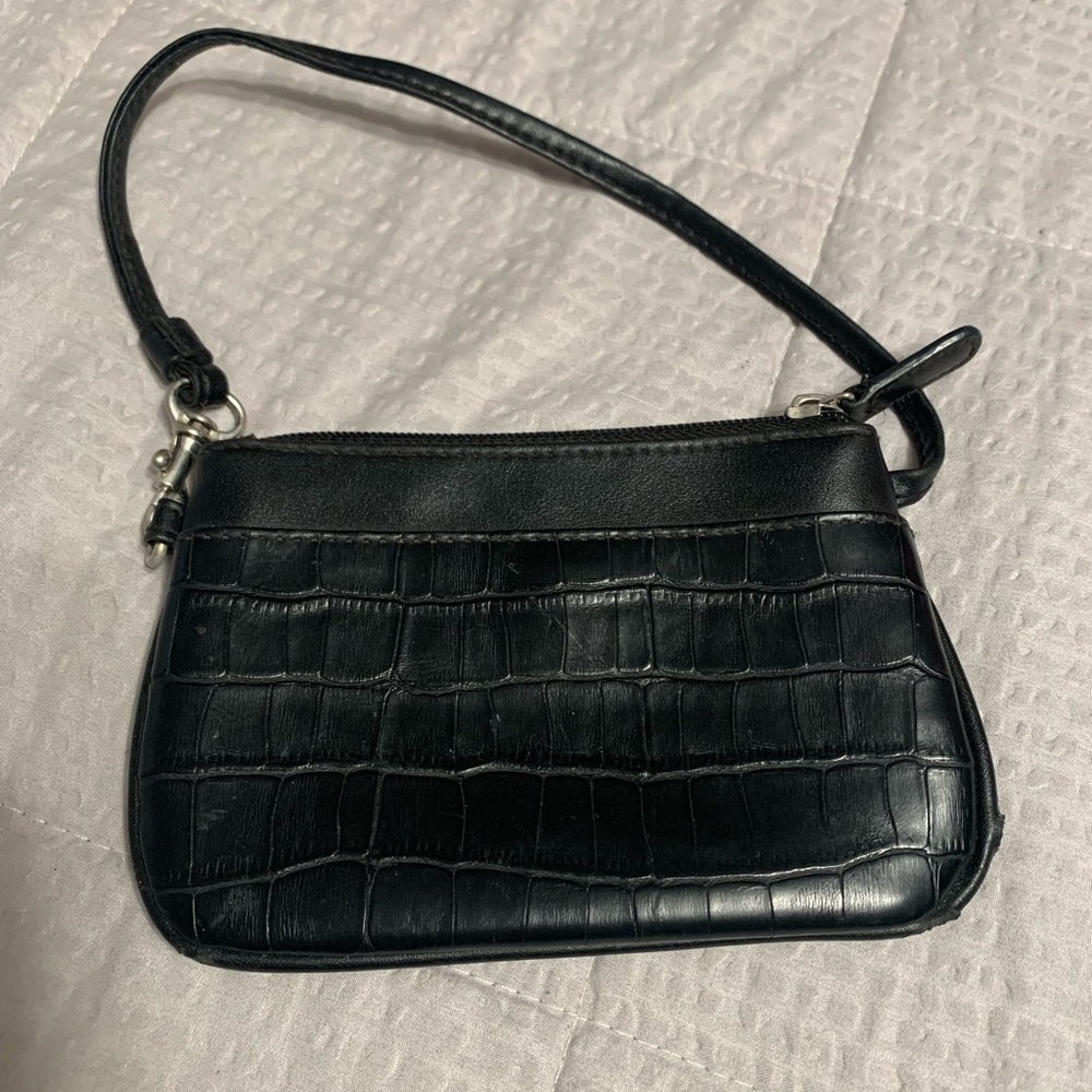 3/$32 Liz Claiborne black croc-like zip closure wristlet. Exterior snap pocket.